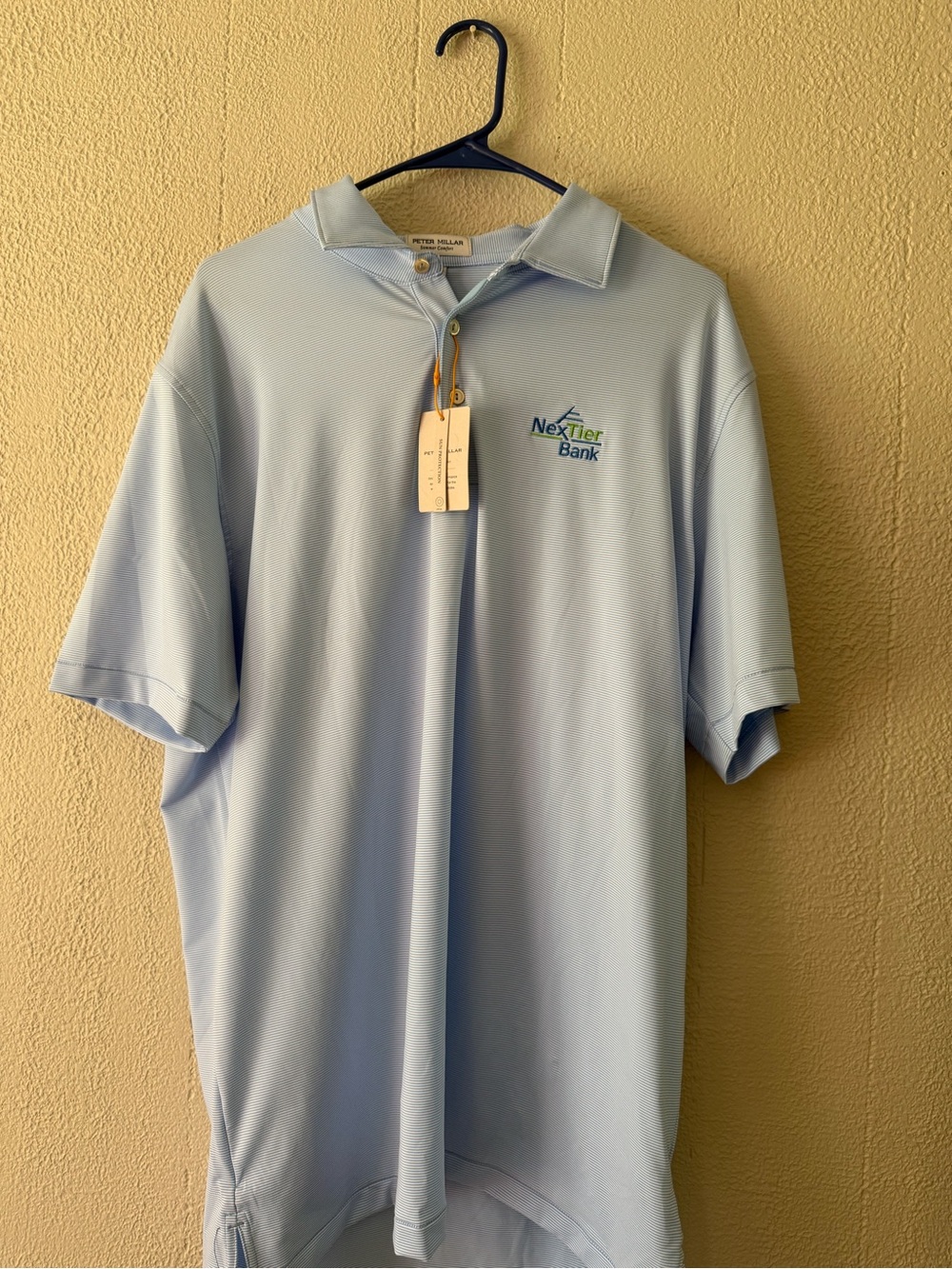 Peter Millar Light Blue Polo with NexTier Bank Embroidery